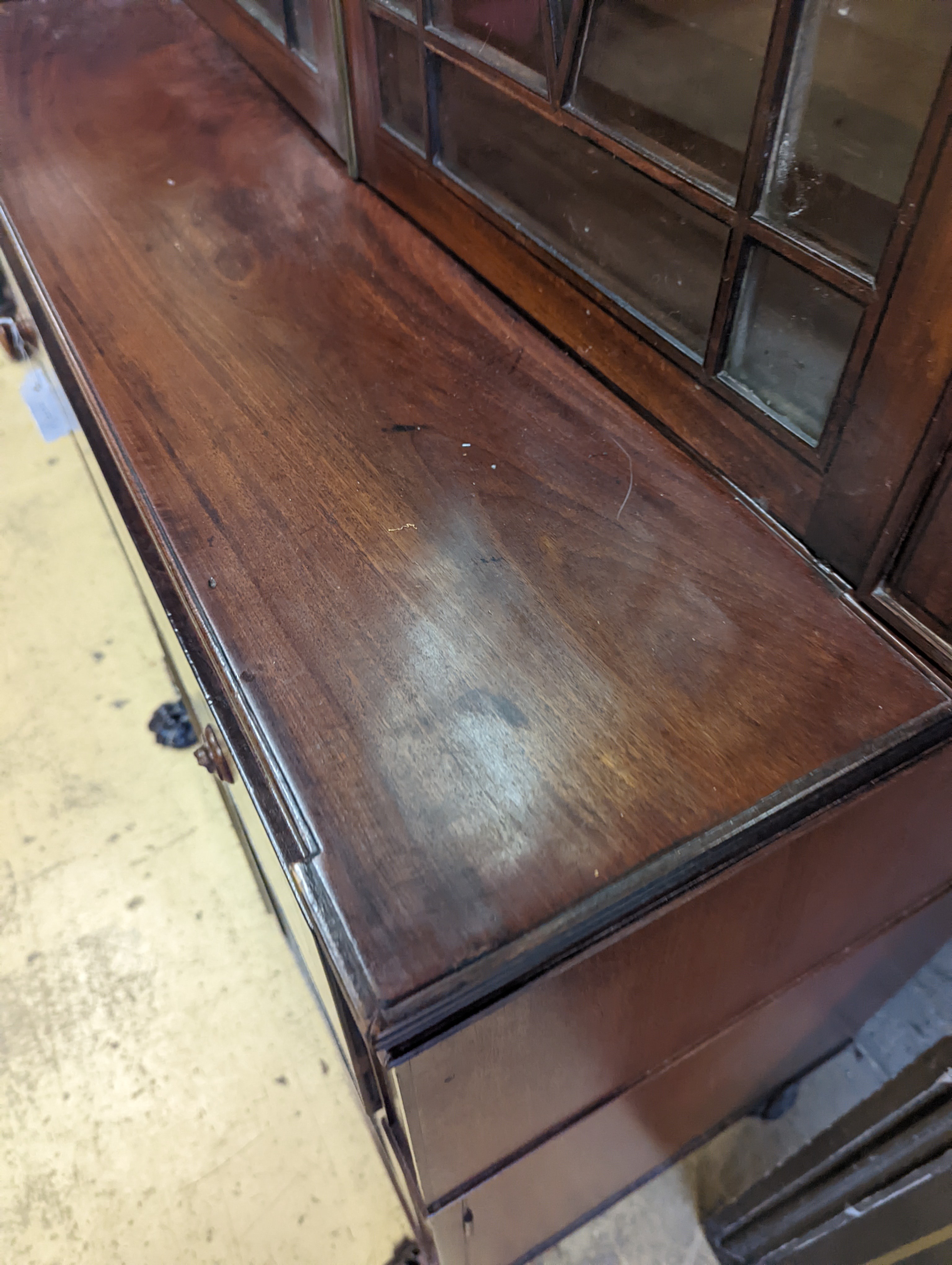 A Regency mahogany secretaire bookcase on lion paws feet, length 100cm, depth 56cm, height 216cm
